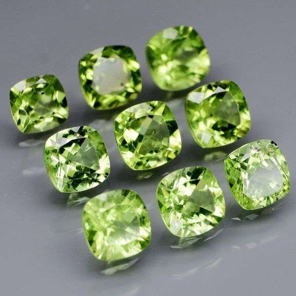 High fire 5.43ct 5mm cushion cut Peridot set