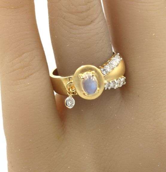 18kt Yellow gold oval moon stone and bezel diamond charm ring