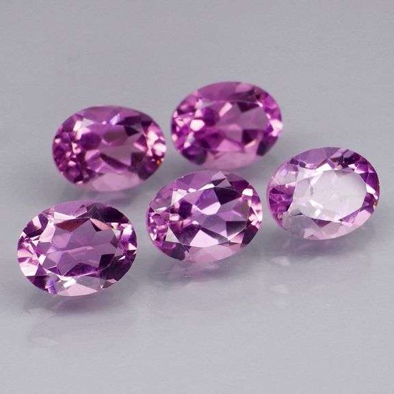Glittering 8.20ct oval cut Bolivian Amethyst set
