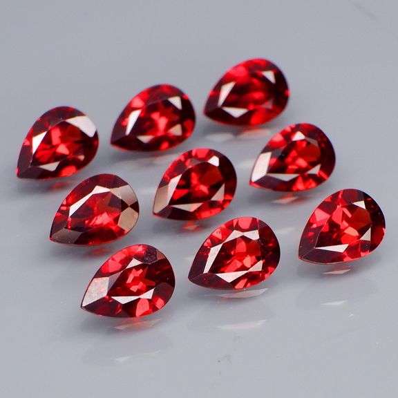 Top color!! 7.37ct 9pc Mozambique Garnet set