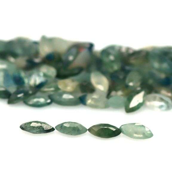 Stunning blue green 9.45ct marquise cut Sapphire set