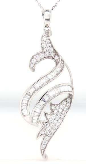 18kt White gold cubic zirconia bagutte with round swirl necklace