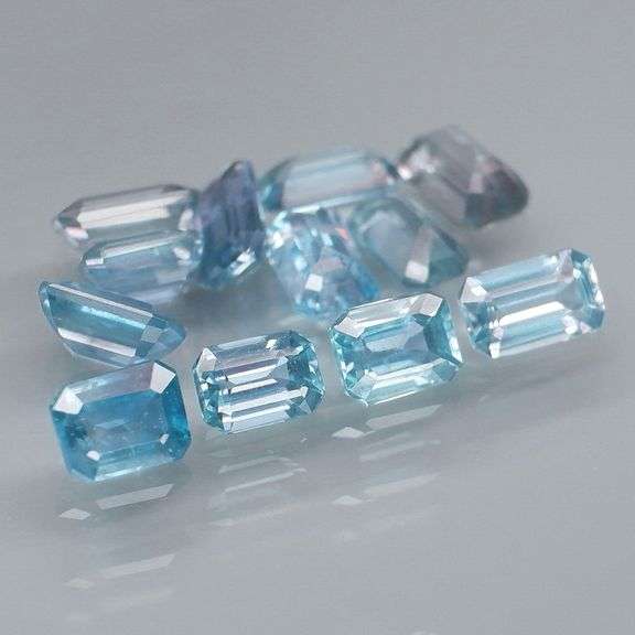 Sky blue 4.21ct emerald cut Sapphire set