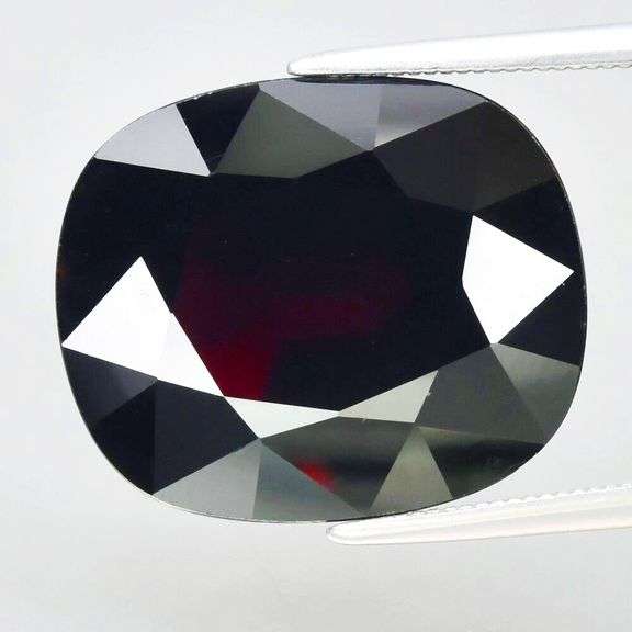 Exceptionally cut 12.84ct Midnight crimson Tanzanian Garnet