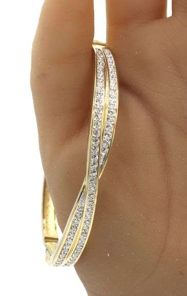 Swarovski gold tone crystal bangle bracelet