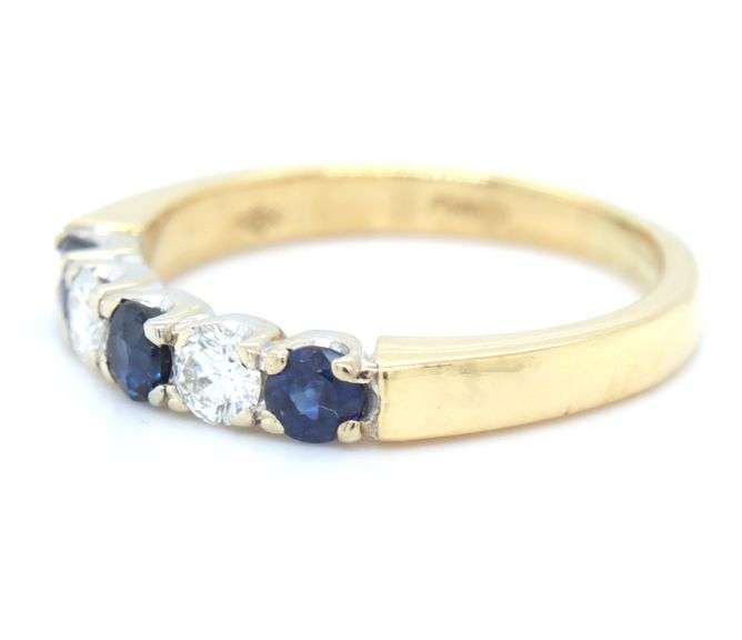 18kt Yellow gold diamond and blue sapphire band