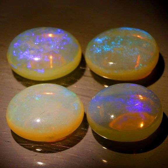 Neon flashing 7.21ct set of untreated Opals
