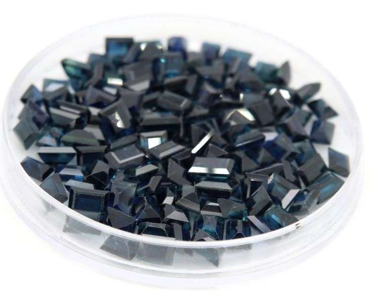 Serious 41.34ct royal blue baguette cut Sapphire set
