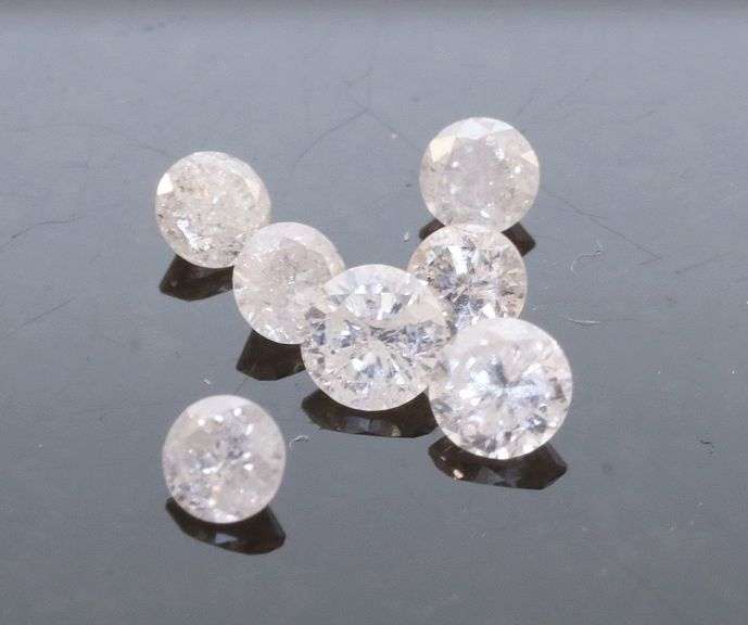 Sparkling .43ct set of round brilliant Diamonds!