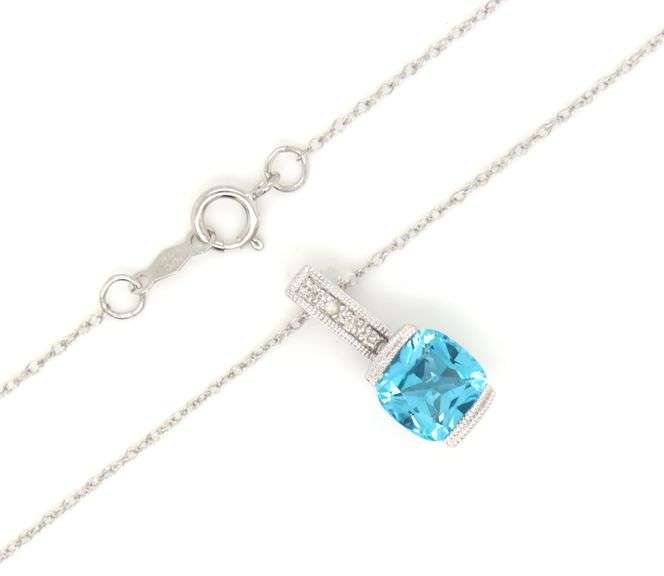 10kt White gold blue topaz and diamond pendant on chain