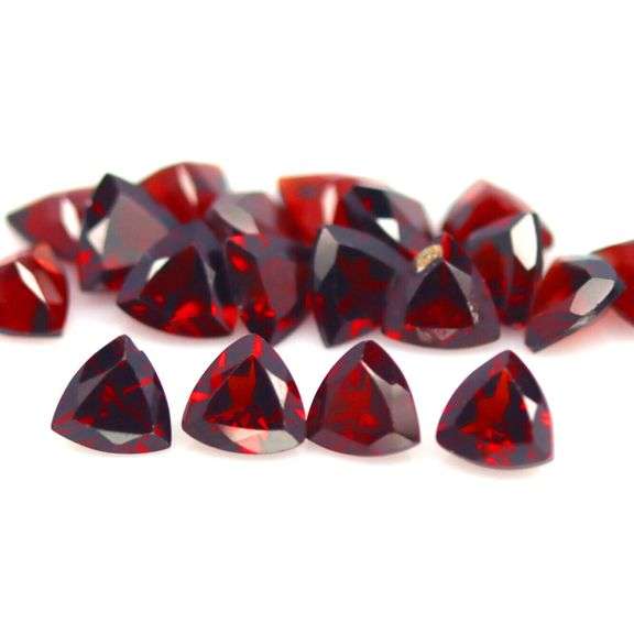 Deep burgundy 10.62ct trillion cut untreated Garnet set