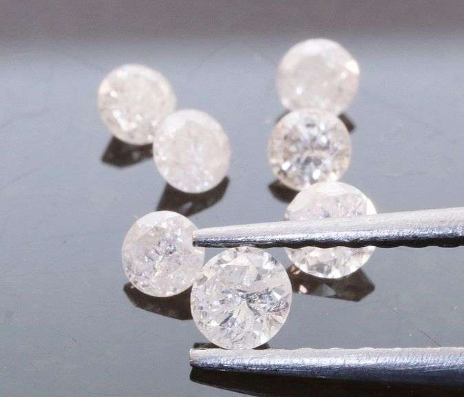 Sparkling .43ct set of round brilliant Diamonds!