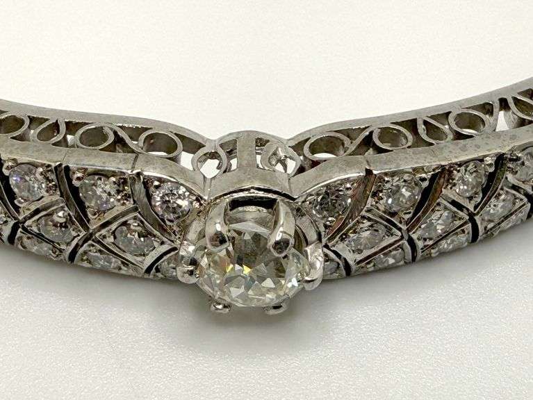Fantastic diamond  bangle in 14k white gold , size 2.5 x2.0 inch