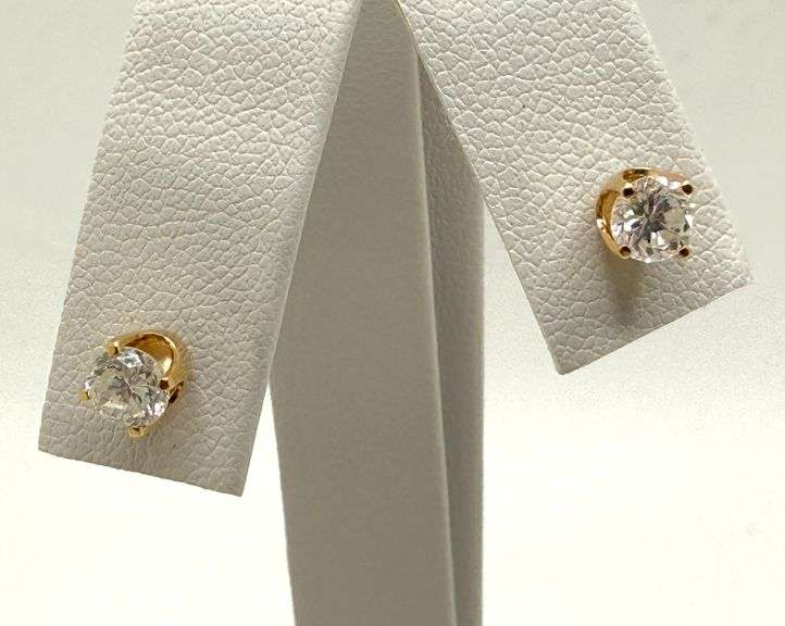 14k yellow gold diamond studs. .50 ctw