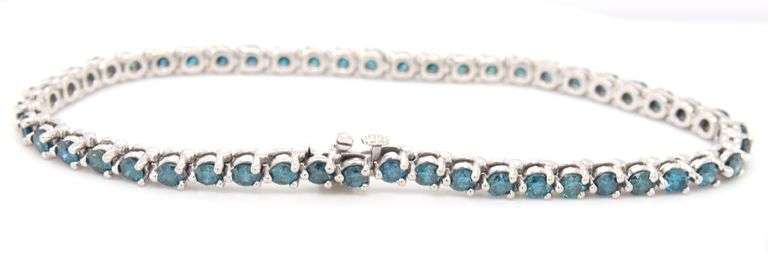 14kt White gold treated blue diamond tennis bracelet