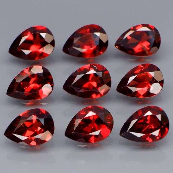 Premium 7.12ct pear cut cherry red Garnet set