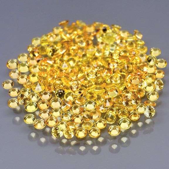 SUPERB!!! VS to eye clean 4.05ct canary yellow Sapphire set