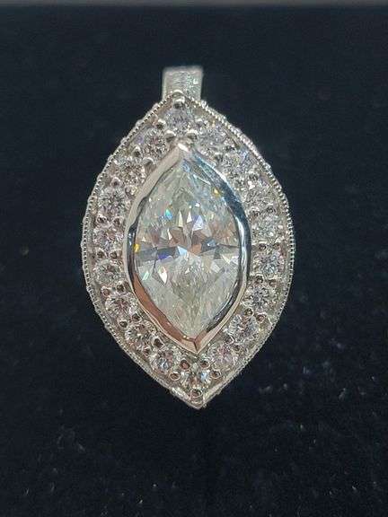 A stunning platinum ring with marquise diamond