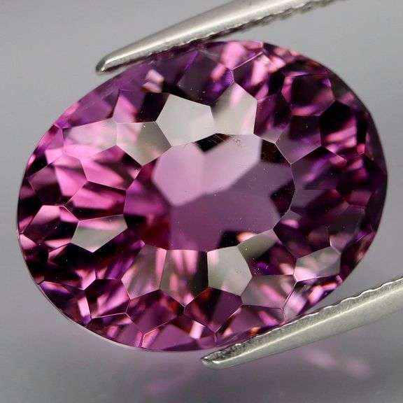 Amazing 10.63ct high fire concave cut pure Amethyst