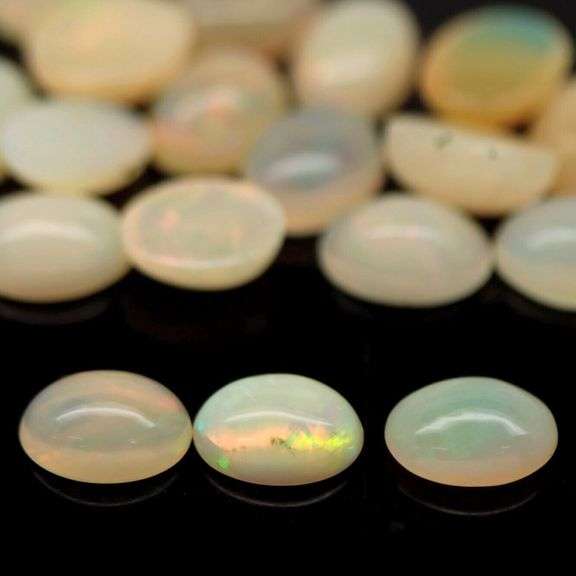 Smoldering 9.08ct unheated Jelly Opal set