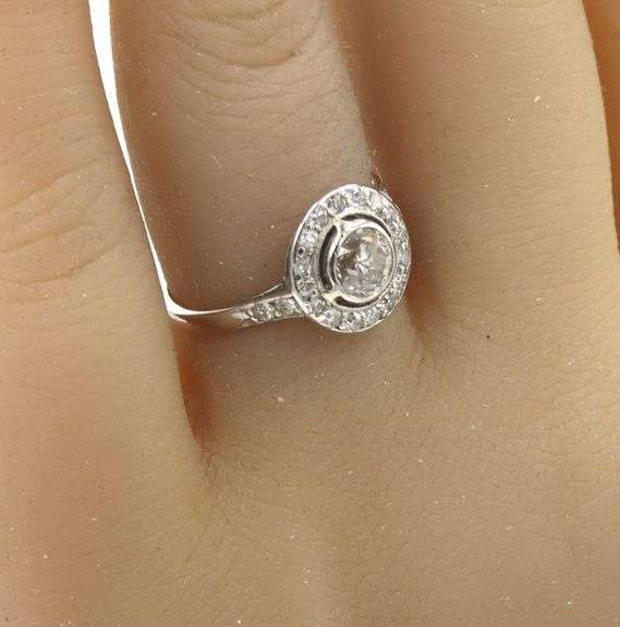 Platinum 0.50ctw European cut halo diamond ring