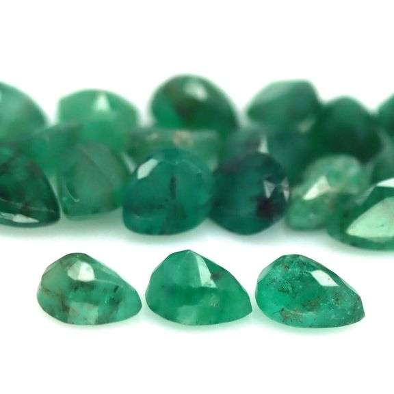 Rich green unheated 9.45ct Zambian Emerald set