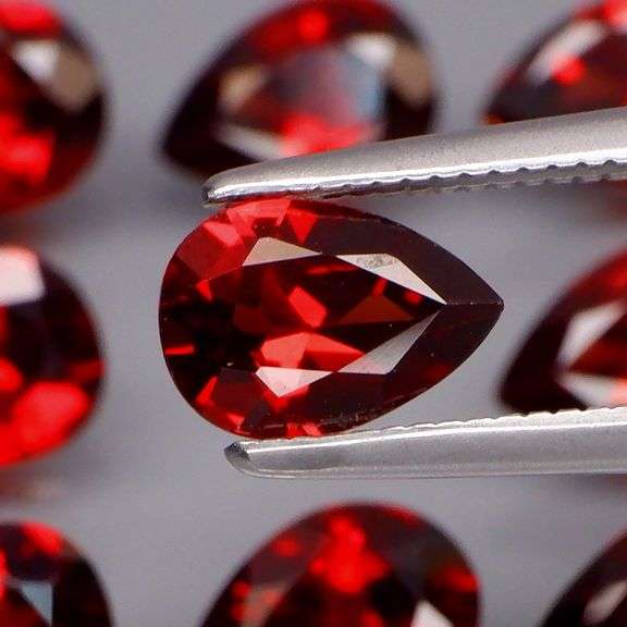 Premium 7.12ct pear cut cherry red Garnet set