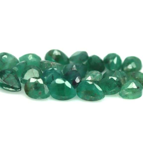 Rich green unheated 9.45ct Zambian Emerald set