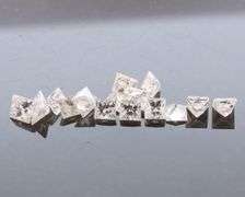 Glittering! Full .77ct set of princess cut Diamonds!