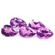 Eye catching 14ct matched bright purple Amethyst set