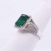 Deep green Emerald and Diamond Ring
