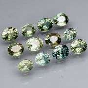Awesome 3.43ct oval cut GREEN Sapphire set