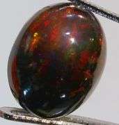 Glistening 1.89ct smoldering Black Opal