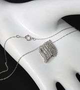 10kt White gold diamond cluster swirl pendant on chain