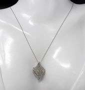 10kt White gold diamond cluster swirl pendant on chain