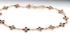14kt Yellow gold ruby and sapphire bezel set bracelet