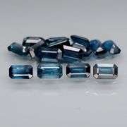 Deep blue 4.92ct emerald cut Sapphire set