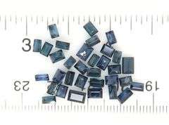 Serious 41.34ct royal blue baguette cut Sapphire set