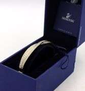 Swarovski gold tone crystal bangle bracelet