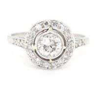 Platinum 0.50ctw European cut halo diamond ring