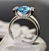 Modern 14K White Gold Blue Topaz Ring