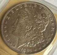 Sharper Unc 1884 O Morgan Dollar
