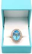 Bewitching Massive 15.80CTS Oval Shaped Millennium-Cut Blue Topaz & 0.95CTW Diamonds in 14K Yellow G