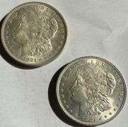 2 Gem BU 1921 Frosty White Morgan Dollars.