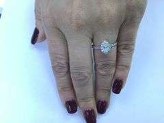 UNIQUE 14 K WHITE GOLD ENGAGEMENT RING