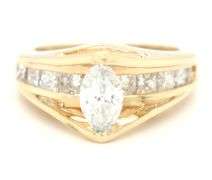 14kt Yellow gold 1.72ctw diamond ring with a tapered shank