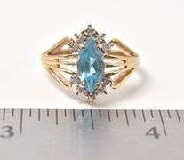 Tasteful Topaz and Diamond Ring in 10K Yellow Gold