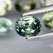 Awesome 3.43ct oval cut GREEN Sapphire set