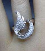 18kt White gold cubic zirconia baguette with pave diamond wave ring