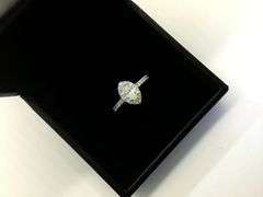 UNIQUE 14 K WHITE GOLD ENGAGEMENT RING